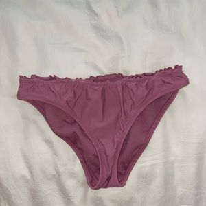 Purple ruffle bathing suit bottom.